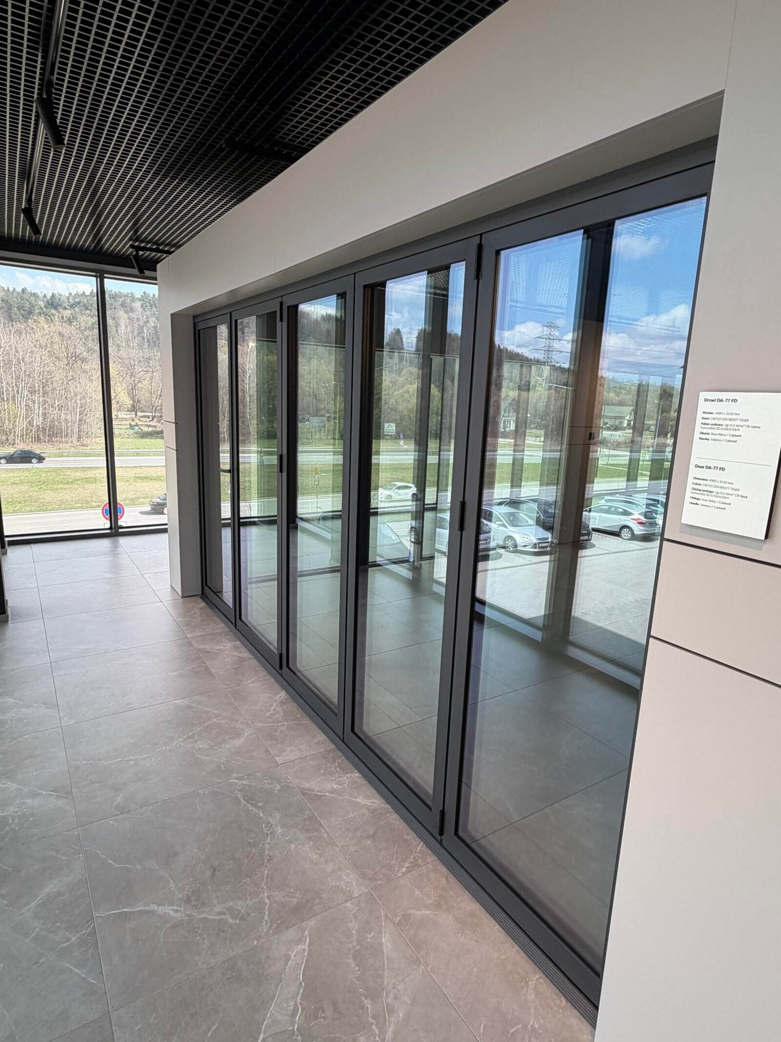 porte accordéon aluminium triple vitrage Limoges baie vitrée grande ouverture moderne